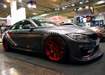 BMW F82 M4 At Essen Motorshow Candy Red Rims 01