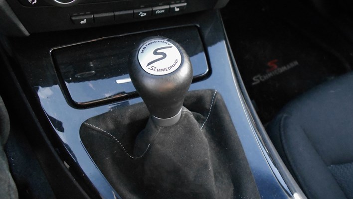 Schmiedmann Motorsport gear emblem.